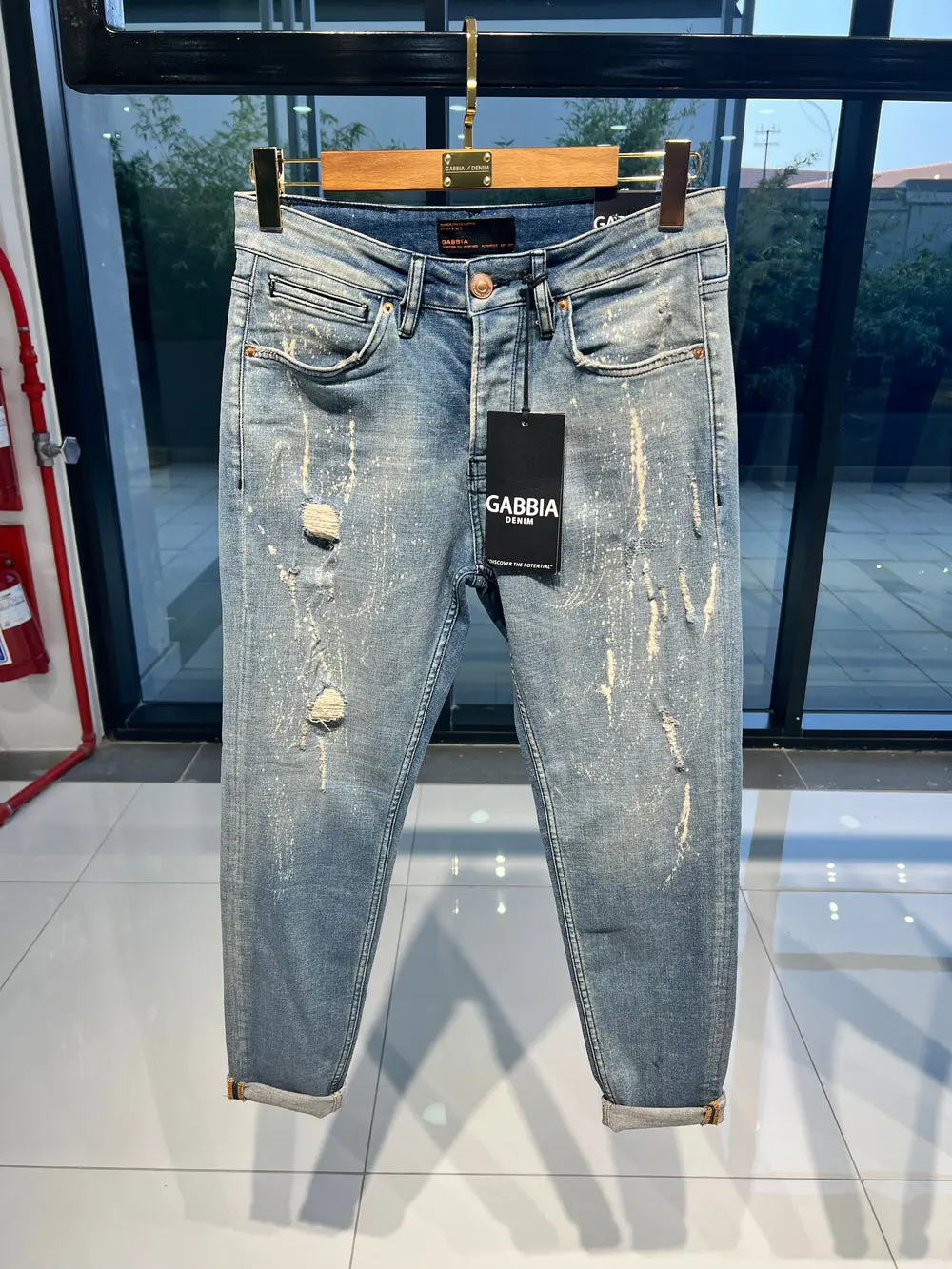 Men's Jeans Light Blue Ripped Design — photograph 1
